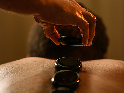 Hot stone massage as part of a wellness treatment at Hotel Winzer