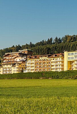 Exterior view of the Hotel Winzer on a sunny day