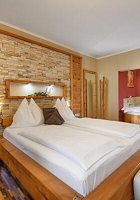 Deluxe Cosy Dream Junior Suite with whirlpool and fireplace at Hotel Winzer
